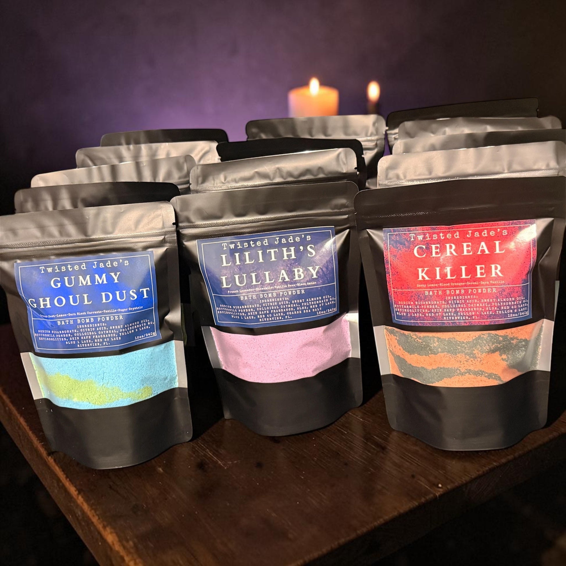 Twisted Jade's Lilith's Lullaby bath bomb powder pouch with pink and purple dust. Scented with chamomile, lavender, vanilla, and black amber.