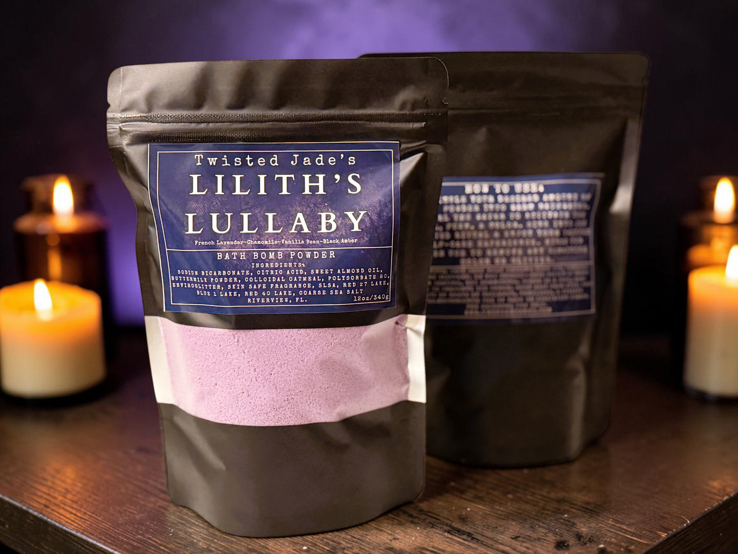 Twisted Jade's Lilith's Lullaby bath bomb powder in a black pouch with purple powder. Scented with chamomile, lavender, vanilla, and black amber.